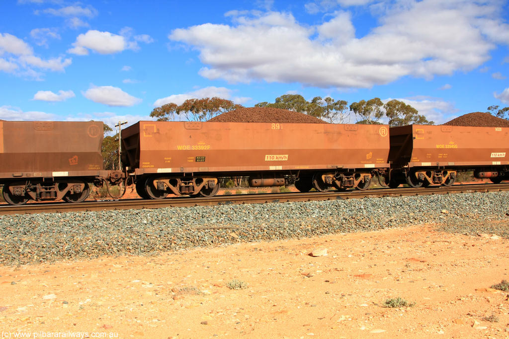 100731 02917
WOE type iron ore waggon WOE 33392 is one of a batch of one hundred and forty one built by United Group Rail WA between November 2005 and April 2006 with serial number 950142-097 and fleet number 891 for Koolyanobbing iron ore operations, on loaded train 7415 at Binduli Triangle, 31st July 2010.
Keywords: WOE-type;WOE33392;United-Group-Rail-WA;950142-097;