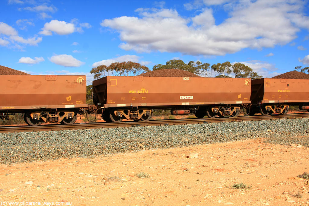 100731 02920
WOE type iron ore waggon WOE 33557 is one of a batch of one hundred and twenty eight built by United Group Rail WA between August 2008 and March 2009 with serial number 950211-097 and fleet number 9052 for Koolyanobbing iron ore operations, on loaded train 7415 at Binduli Triangle, 31st July 2010.
Keywords: WOE-type;WOE33557;United-Group-Rail-WA;950211-097;
