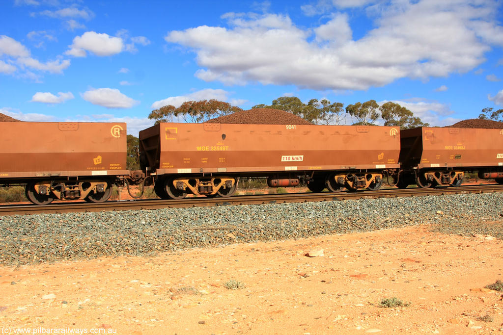 100731 02921
WOE type iron ore waggon WOE 33549 is one of a batch of one hundred and twenty eight built by United Group Rail WA between August 2008 and March 2009 with serial number 950211-089 and fleet number 9041 for Koolyanobbing iron ore operations, on loaded train 7415 at Binduli Triangle, 31st July 2010.
Keywords: WOE-type;WOE33549;United-Group-Rail-WA;950211-089;
