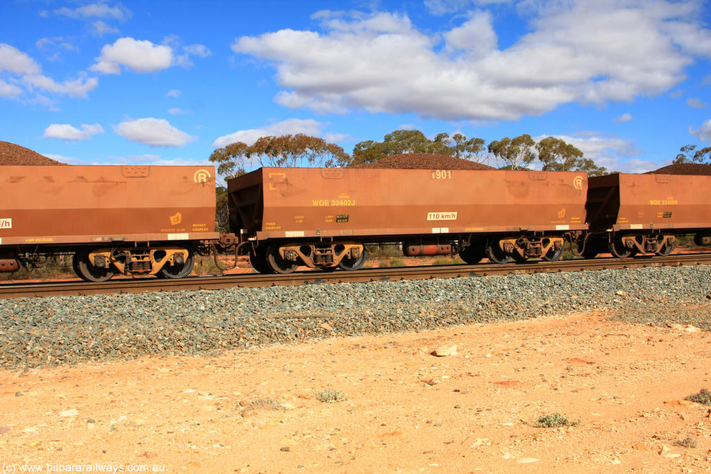 100731 02922
WOE type iron ore waggon WOE 33402 is one of a batch of one hundred and forty one built by United Group Rail WA between November 2005 and April 2006 with serial number 950142-107 and fleet number 8901 for Koolyanobbing iron ore operations, on loaded train 7415 at Binduli Triangle, 31st July 2010.
Keywords: WOE-type;WOE33402;United-Group-Rail-WA;950142-107;