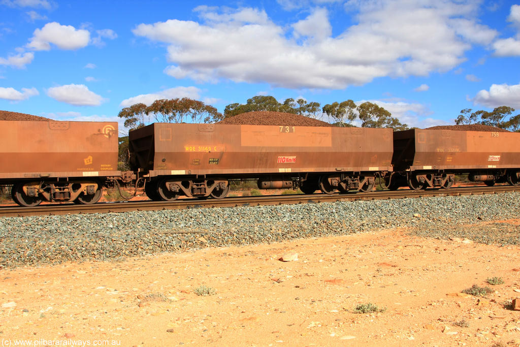 100731 02927
WOE type iron ore waggon WOE 31149 is one of a batch of fifteen built by Goninan WA between April and May 2002 with fleet number 731 for Koolyanobbing iron ore operations, on loaded train 7415 at Binduli Triangle, 31st July 2010.
Keywords: WOE-type;WOE31149;Goninan-WA;
