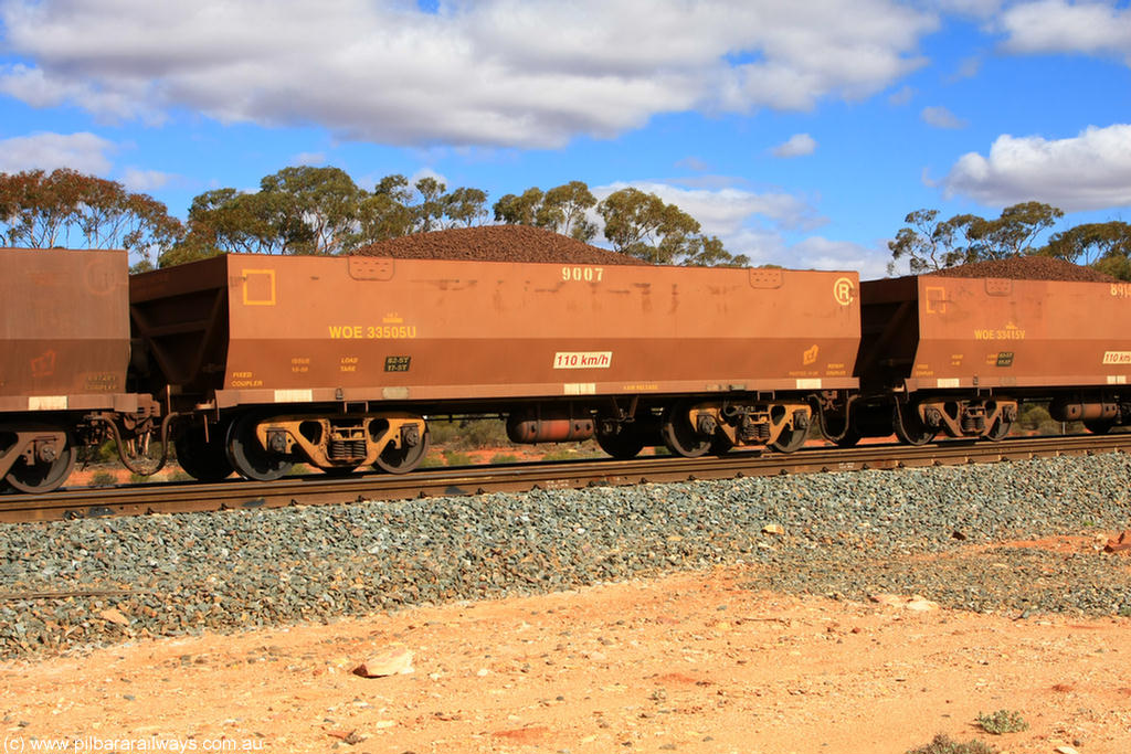 100731 02930
WOE type iron ore waggon WOE 33505 is one of a batch of one hundred and twenty eight built by United Group Rail WA between August 2008 and March 2009 with serial number 950211-045 and fleet number 9007 for Koolyanobbing iron ore operations, on loaded train 7415 at Binduli Triangle, 31st July 2010.
Keywords: WOE-type;WOE33505;United-Group-Rail-WA;950211-045;