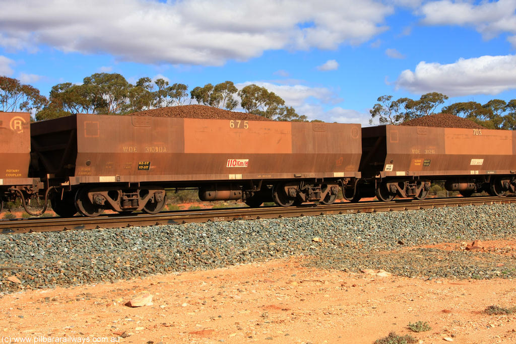 100731 02932
WOE type iron ore waggon WOE 31090 is one of a batch of one hundred and thirty built by Goninan WA between March and August 2001 with serial number 950092-080 and fleet number 675 for Koolyanobbing iron ore operations, on loaded train 7415 at Binduli Triangle, 31st July 2010.
Keywords: WOE-type;WOE31090;Goninan-WA;950092-080;