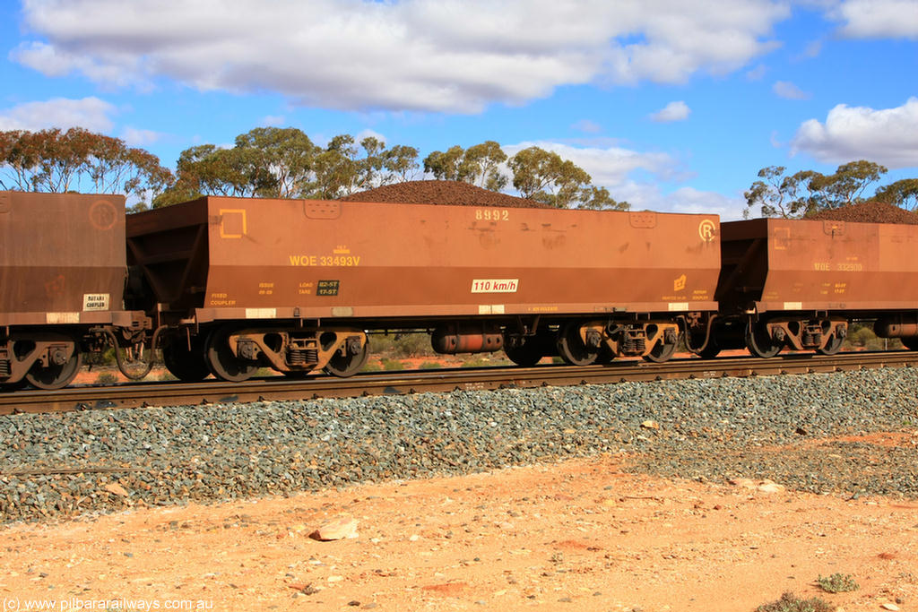 100731 02934
WOE type iron ore waggon WOE 33493 is one of a batch of one hundred and twenty eight built by United Group Rail WA between August 2008 and March 2009 with serial number 950211-033 and fleet number 8992 for Koolyanobbing iron ore operations, on loaded train 7415 at Binduli Triangle, 31st July 2010.
Keywords: WOE-type;WOE33493;United-Group-Rail-WA;950211-033;