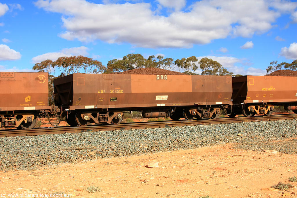 100731 02945
WOE type iron ore waggon WOE 30258 is one of a batch of one hundred and thirty built by Goninan WA between March and August 2001 with serial number 950092-008 and fleet number 608 for Koolyanobbing iron ore operations, on loaded train 7415 at Binduli Triangle, 31st July 2010.
Keywords: WOE-type;WOE30258;Goninan-WA;950092-008;