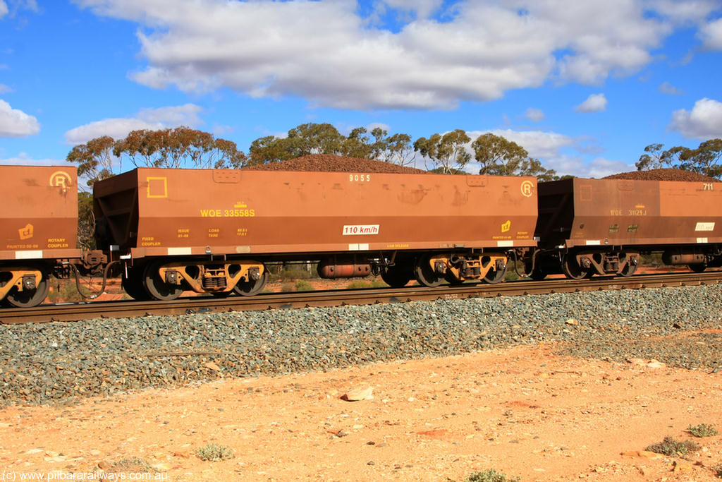 100731 02947
WOE type iron ore waggon WOE 33558 is one of a batch of one hundred and twenty eight built by United Group Rail WA between August 2008 and March 2009 with serial number 950211-098 and fleet number 9055 for Koolyanobbing iron ore operations, on loaded train 7415 at Binduli Triangle, 31st July 2010.
Keywords: WOE-type;WOE33558;United-Group-Rail-WA;950211-098;