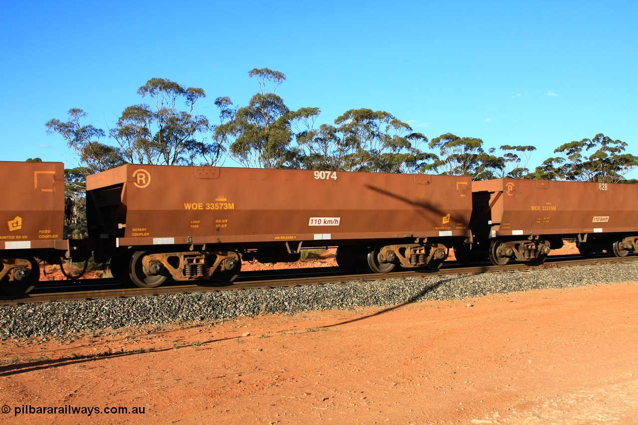 100731 03061
WOE type iron ore waggon WOE 33573 is one of a batch of one hundred and twenty eight built by United Group Rail WA between August 2008 and March 2009 with serial number 950211-113 and fleet number 9074 for Koolyanobbing iron ore operations, empty train arriving at Binduli Triangle, 31st July 2010.
Keywords: WOE-type;WOE33573;United-Group-Rail-WA;950211-113;