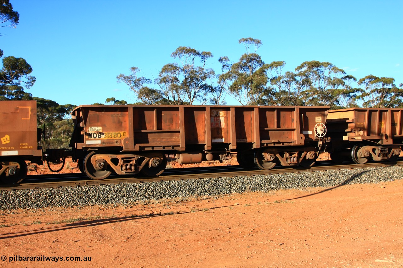 100731 03063
WOB type iron ore waggon WOB 31380 is one of a batch of twenty five built by Comeng WA between 1974 and 1975 and converted from Mt Newman high sided waggons by WAGR Midland Workshops with a capacity of 67 tons with fleet number 305 for Koolyanobbing iron ore operations, empty train arriving at Binduli Triangle, 31st July 2010.
Keywords: WOB-type;WOB31380;Comeng-WA;Mt-Newman-Mining;