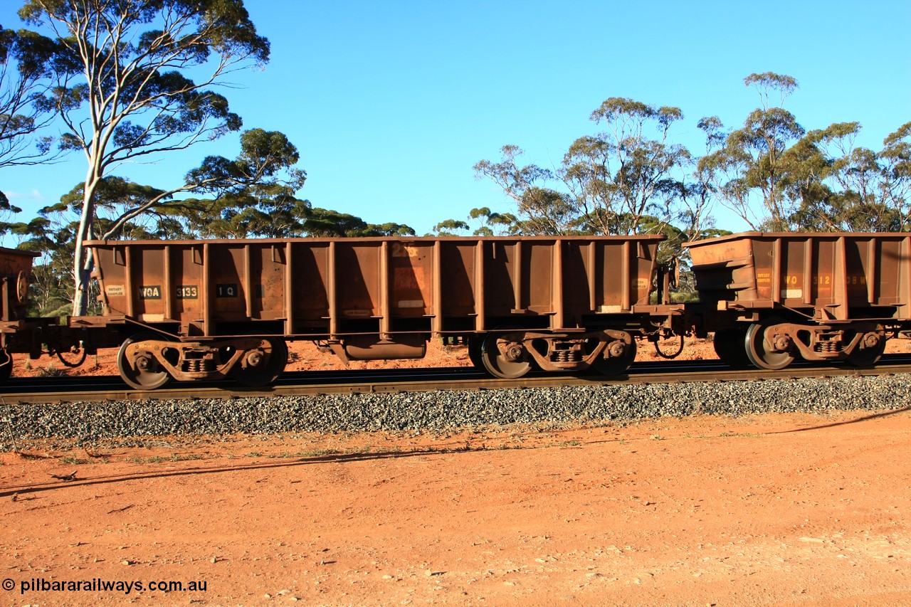 100731 03070
WOA type iron ore waggon WOA 31331 is one of a batch of thirty nine built by WAGR Midland Workshops between 1970 and 1971 with fleet number 213 for Koolyanobbing iron ore operations, with a 75 ton and 1018 ft³ capacity, empty train arriving at Binduli Triangle, 31st July 2010.
Keywords: WOA-type;WOA31331;WAGR-Midland-WS;