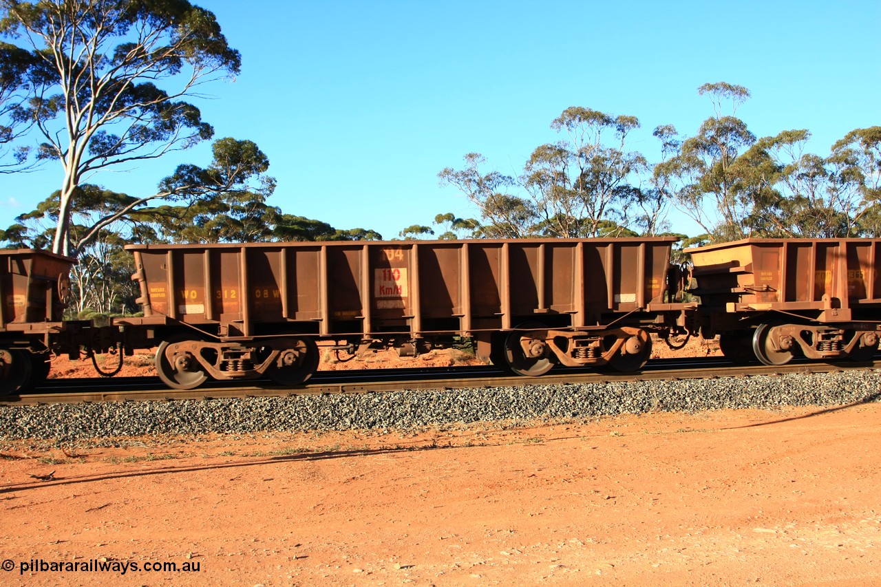 100731 03071
WO type iron ore waggon WO 31208 is one of a batch of eighty six built by WAGR Midland Workshops between 1967 and March 1968 with fleet number 104 for Koolyanobbing iron ore operations, with a 75 ton and 1018 ft³ capacity, empty train arriving at Binduli Triangle, 31st July 2010. This unit was converted to WOC for coal in 1986 till 1994 when it was re-classed back to WO.
Keywords: WO-type;WO31208;WAGR-Midland-WS;