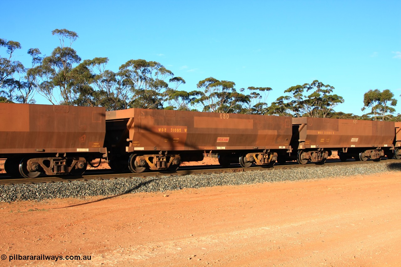 100731 03089
WOE type iron ore waggon WOE 31095 is one of a batch of one hundred and thirty built by Goninan WA between March and August 2001 with serial number 950092-085 and fleet number 680 for Koolyanobbing iron ore operations, empty train arriving at Binduli Triangle, 31st July 2010.
Keywords: WOE-type;WOE31095;Goninan-WA;950092-085;
