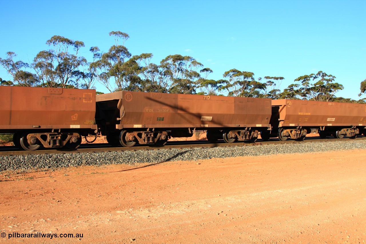 100731 03103
WOE type iron ore waggon WOE 31130 is one of a batch of one hundred and thirty built by Goninan WA between March and August 2001 with serial number 950092-120 and fleet number 712 for Koolyanobbing iron ore operations, empty train arriving at Binduli Triangle, 31st July 2010.
Keywords: WOE-type;WOE31130;Goninan-WA;950092-120;