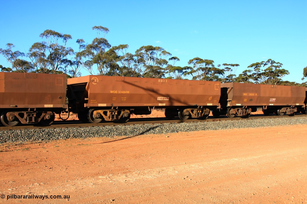 100731 03104
WOE type iron ore waggon WOE 33484 is one of a batch of one hundred and twenty eight built by United Group Rail WA between August 2008 and March 2009 with serial number 950211-??? and fleet number 8977 for Koolyanobbing iron ore operations, empty train arriving at Binduli Triangle, 31st July 2010.
Keywords: WOE-type;WOE33484;United-Group-Rail-WA;