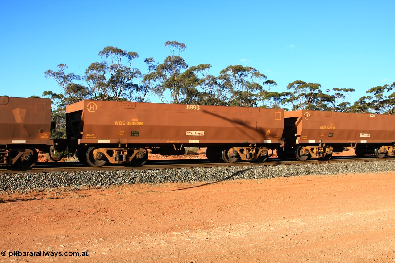 100731 03114
WOE type iron ore waggon WOE 33492 is one of a batch of one hundred and twenty eight built by United Group Rail WA between August 2008 and March 2009 with serial number 950211-032 and fleet number 8993 for Koolyanobbing iron ore operations, empty train arriving at Binduli Triangle, 31st July 2010.
Keywords: WOE-type;WOE33492;United-Group-Rail-WA;950211-032;