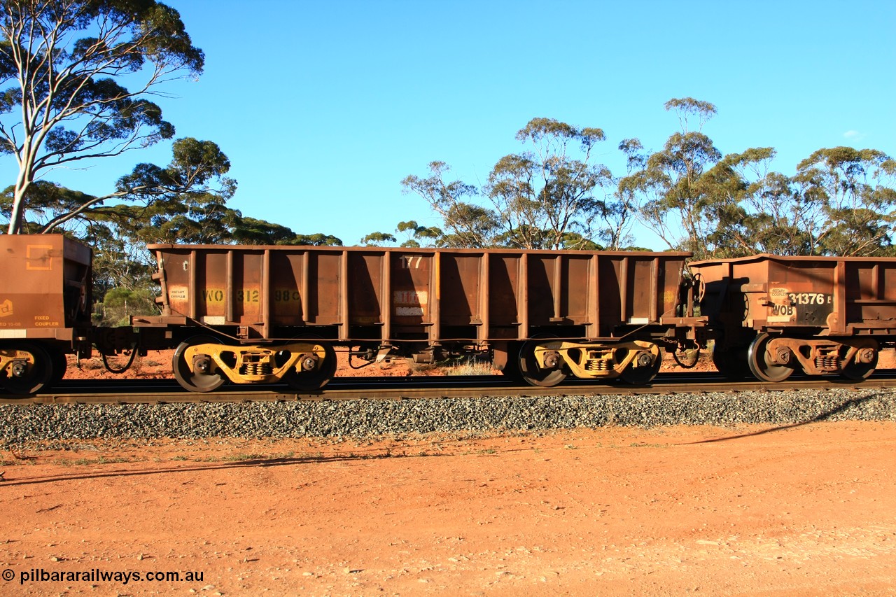 100731 03116
WO type iron ore waggon WO 31298 is one of a batch of fifteen built by WAGR Midland Workshops between July and October 1968 with fleet number 177 for Koolyanobbing iron ore operations, with a 75 ton and 1018 ft³ capacity, empty train arriving at Binduli Triangle, 31st July 2010. This unit was converted to WOC for coal in 1986 till 1994 when it was re-classed back to WO.
Keywords: WO-type;WO31298;WAGR-Midland-WS;