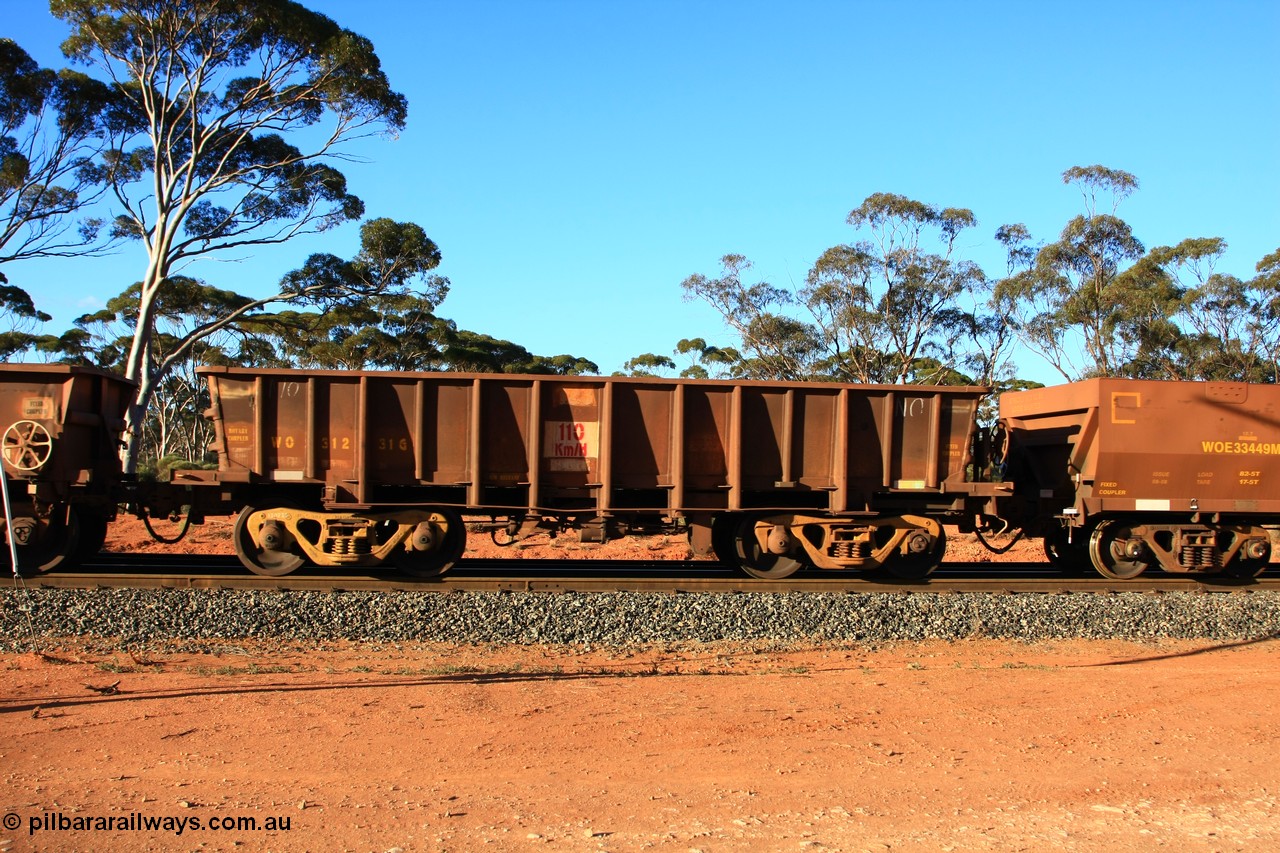 100731 03118
WO type iron ore waggon WO 31231 is one of a batch of eighty six built by WAGR Midland Workshops between 1967 and March 1968 with fleet number 123 for Koolyanobbing iron ore operations, with a 75 ton and 1018 ft³ capacity, empty train arriving at Binduli Triangle, 31st July 2010. This unit was converted to WOC for coal in 1986 till 1994 when it was re-classed back to WO.
Keywords: WO-type;WO31231;WAGR-Midland-WS;