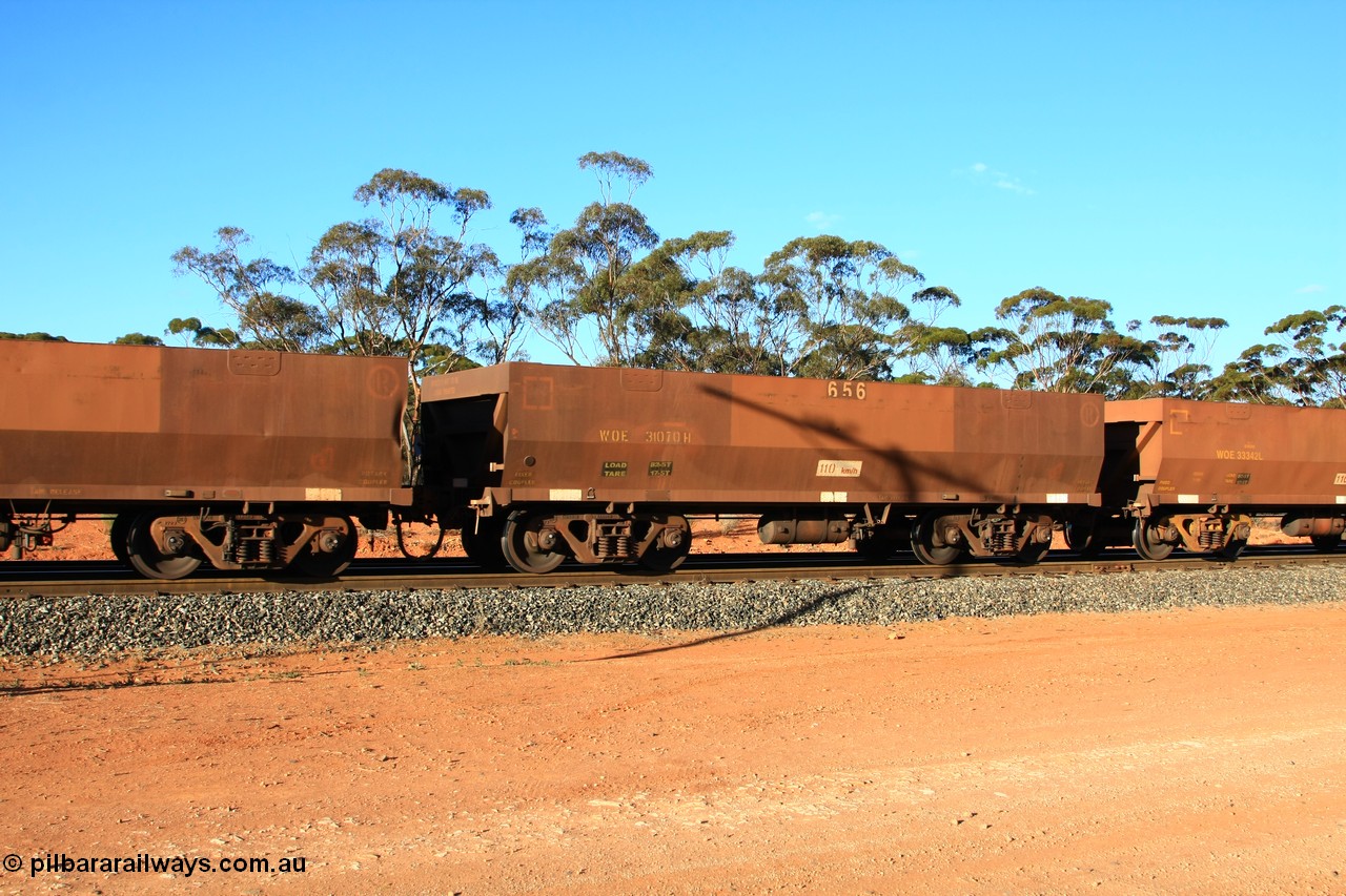100731 03135
WOE type iron ore waggon WOE 31070 is one of a batch of one hundred and thirty built by Goninan WA between March and August 2001 with serial number 950092-060 and fleet number 656 for Koolyanobbing iron ore operations, empty train arriving at Binduli Triangle, 31st July 2010.
Keywords: WOE-type;WOE31070;Goninan-WA;950092-060;