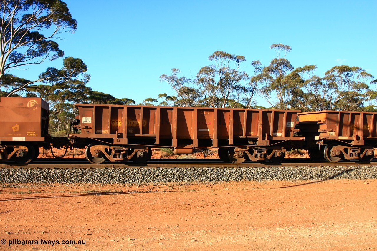 100731 03137
WOC type iron ore waggon WOC 31342 is one of a batch of thirty built by Goninan WA between October 1997 to January 1998 with fleet number 402 for Koolyanobbing iron ore operations with a 75 ton capacity and lettered for KIPL, Koolyanobbing Iron Pty Ltd with the IP painted out, empty train arriving at Binduli Triangle, 31st July 2010.
Keywords: WOC-type;WOC31342;Goninan-WA;