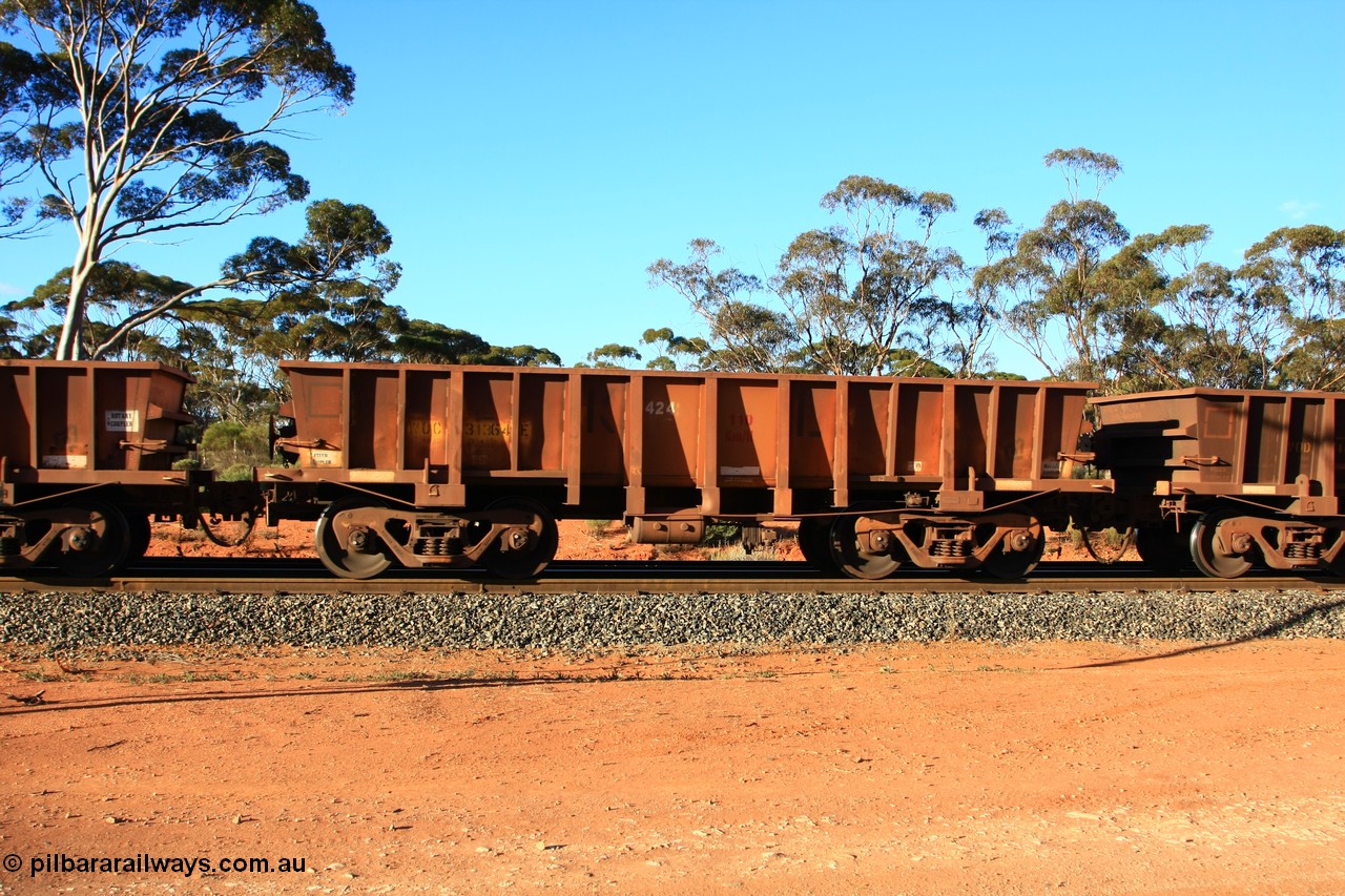 100731 03138
WOC type iron ore waggon WOC 31364 is one of a batch of thirty built by Goninan WA between October 1997 to January 1998 with fleet number 424 for Koolyanobbing iron ore operations with a 75 ton capacity and lettered for KIPL, Koolyanobbing Iron Pty Ltd, with the IP painted over, empty train arriving at Binduli Triangle, 31st July 2010.
Keywords: WOC-type;WOC31364;Goninan-WA;