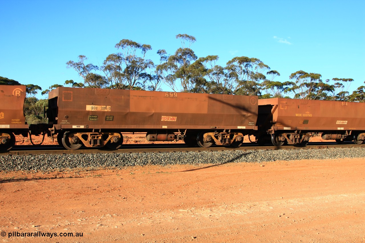 100731 03153
WOE type iron ore waggon WOE 31116 is one of a batch of one hundred and thirty built by Goninan WA between March and August 2001 with serial number 950092-106 and fleet number 699 for Koolyanobbing iron ore operations with PORTMAN painted out and the load revised to 82.5 tonnes, empty train arriving at Binduli Triangle, 31st July 2010.
Keywords: WOE-type;WOE31116;Goninan-WA;950092-106;