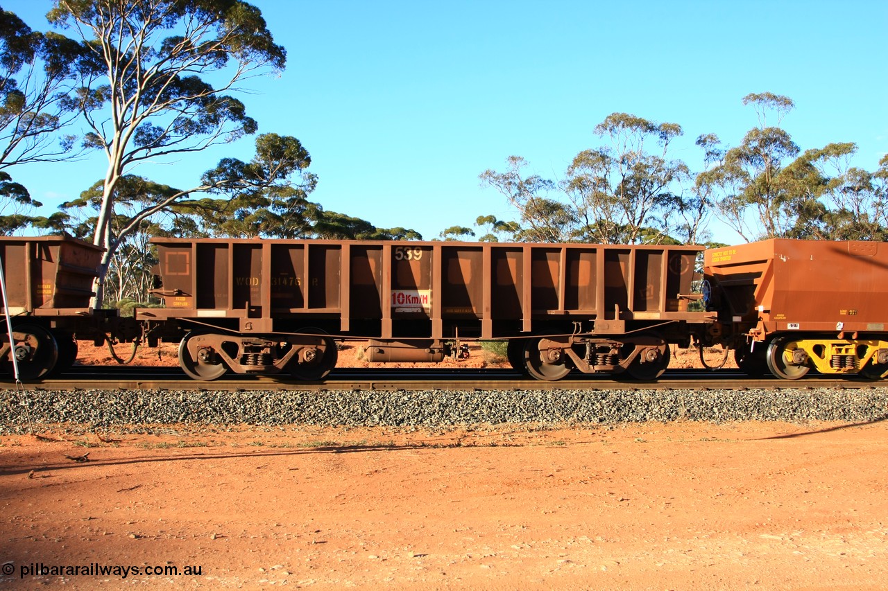 100731 03163
WOD type iron ore waggon WOD 31476 is one of a batch of sixty two built by Goninan WA between April and August 2000 with serial number 950086-048 and fleet number 539 for Koolyanobbing iron ore operations with a 75 ton capacity with a build date of 07/2000, for Portman Mining to cart their Koolyanobbing iron ore to Esperance, with the letters now painted over, empty train arriving at Binduli Triangle, 31st July 2010.
Keywords: WOD-type;WOD31476;Goninan-WA;950086-048;