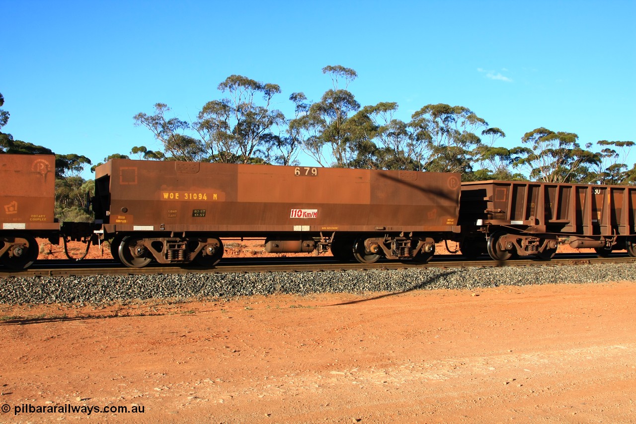 100731 03167
WOE type iron ore waggon WOE 31094 is one of a batch of one hundred and thirty built by Goninan WA between March and August 2001 with serial number 950092-084 and fleet number 679 for Koolyanobbing iron ore operations of 83 tonne load capacity built for Portman Mining with PORTMAN painted out and the load revised down to 82.5 tonnes, empty train arriving at Binduli Triangle, 31st July 2010.
Keywords: WOE-type;WOE31094;Goninan-WA;950092-084;