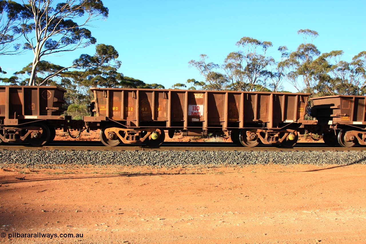 100731 03169
WO type iron ore waggon WO 31241 is one of a batch of eighty six built by WAGR Midland Workshops between 1967 and March 1968 with fleet number 132 for Koolyanobbing iron ore operations, with a 75 ton and 1018 ft³ capacity, empty train arriving at Binduli Triangle, 31st July 2010. This unit was converted to WOS superphosphate in the late 1980s till 1994 when it was re-classed back to WO.
Keywords: WO-type;WO31241;WAGR-Midland-WS;WOS-type;