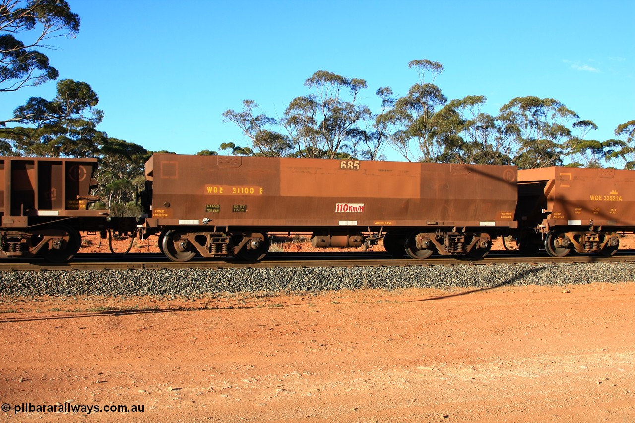 100731 03171
WOE type iron ore waggon WOE 31100 is one of a batch of one hundred and thirty built by Goninan WA between March and August 2001 with serial number 950092-090 and fleet number 685 for Koolyanobbing iron ore operations of 83 tonne load capacity built for Portman Mining with a revised load of 82.5 tonnes and PORTMAN has been painted out, empty train arriving at Binduli Triangle, 31st July 2010.
Keywords: WOE-type;WOE31100;Goninan-WA;950092-090;