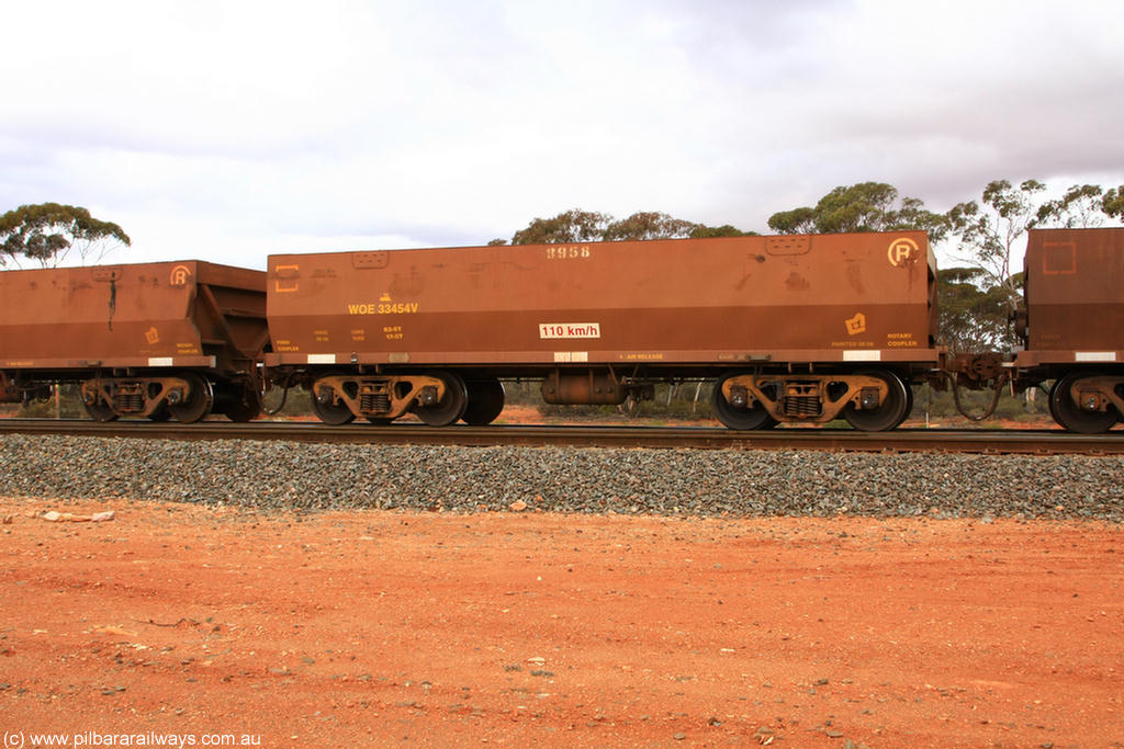 100822 5925
WOE type iron ore waggon WOE 33454 is leader of a batch of five built by United Group Rail WA between August and September 2008 with serial number 950210-001 and fleet number 8958 for Koolyanobbing iron ore operations, Binduli Triangle 22nd August 2010.
Keywords: WOE-type;WOE33454;United-Group-Rail-WA;950210-001;