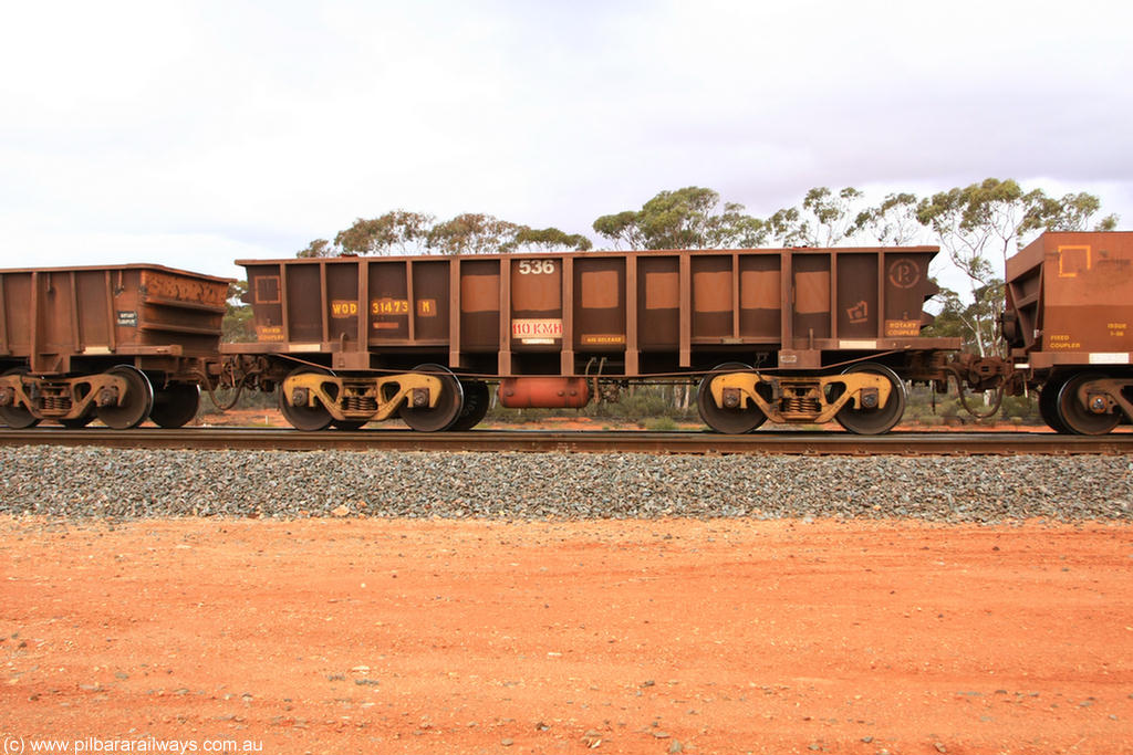 100822 5928
WOD type iron ore waggon WOD 31473 is one of a batch of sixty two built by Goninan WA between April and August 2000 with serial number 950086-045 and fleet number 536 for Koolyanobbing iron ore operations with a 75 ton capacity for Portman Mining to cart their Koolyanobbing iron ore to Esperance, now with PORTMAN painted out, Binduli Triangle 22nd August 2010.
Keywords: WOD-type;WOD31473;Goninan-WA;950086-045;