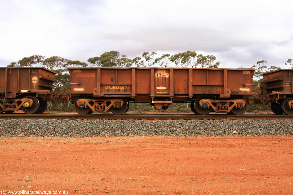 100822 5930
WOB type iron ore waggon WOB 31397 is one of a batch of twenty five built by Comeng WA between 1974 and 1975 and converted from Mt Newman high sided waggons by WAGR Midland Workshops with a capacity of 67 tons with fleet number 321 for Koolyanobbing iron ore operations. This waggon was also converted to a WSM type ballast hopper by re-fitting the cut down top section and having bottom discharge doors fitted, converted back to WOB in 1998, Binduli Triangle 22nd August 2010.
Keywords: WOB-type;WOB31397;Comeng-WA;WSM-type;Mt-Newman-Mining;