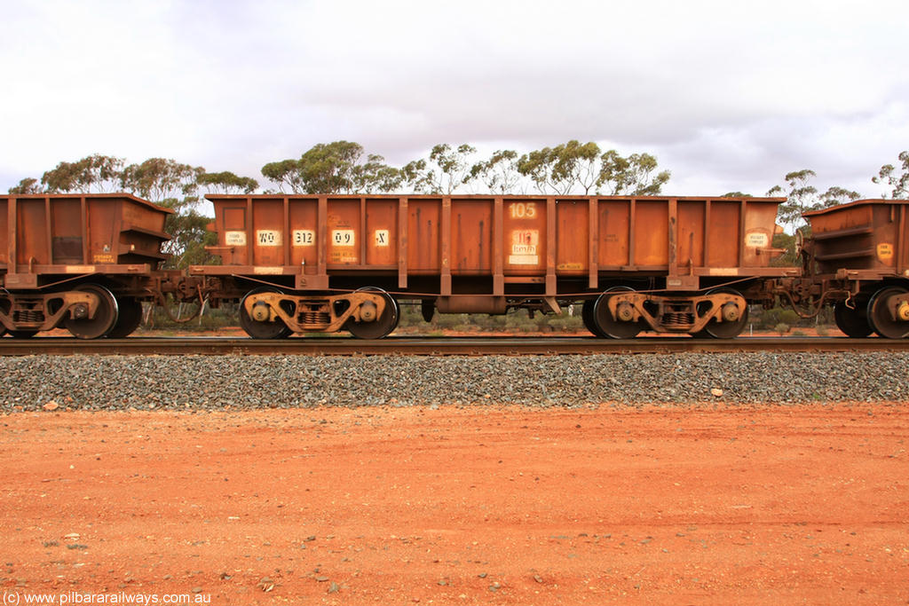 100822 5936
WO type iron ore waggon WO 31209 is leader of a batch of sixty two built by Goninan WA between April and August 2000 with serial number 950086-001 and fleet number 105 for Koolyanobbing iron ore operations, and is a Goninan built replacement WO type waggon with a build date of 05/2000, this replaces the original WAGR built WO type waggon with a WOD type with square features opposed to the curved ones as on the original WO, Binduli Triangle 22nd August 2010.
Keywords: WO-type;WO31209;Goninan-WA;950086-001;