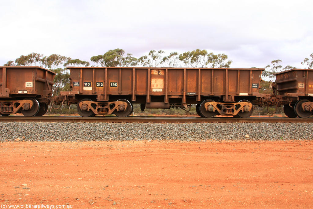 100822 5939
WO type iron ore waggon WO 31269 is one of a batch of eighty six built by WAGR Midland Workshops between 1967 and March 1968 with fleet number 152 for Koolyanobbing iron ore operations, with a 75 ton and 1018 ft³ capacity, Binduli Triangle 22nd August 2010. This unit was converted to WOC for coal in 1986 till 1994 when it was re-classed back to WO.
Keywords: WO-type;WO31269;WAGR-Midland-WS;