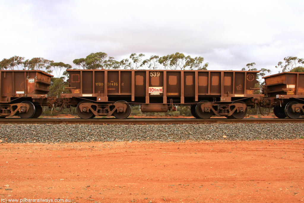 100822 5951
WOD type iron ore waggon WOD 31476 is one of a batch of sixty two built by Goninan WA between April and August 2000 with serial number 950086-048 and fleet number 539 for Koolyanobbing iron ore operations with a 75 ton capacity with a build date of 07/2000, for Portman Mining to cart their Koolyanobbing iron ore to Esperance, with the letters now painted over, Binduli Triangle 22nd August 2010.
Keywords: WOD-type;WOD31476;Goninan-WA;950086-048;