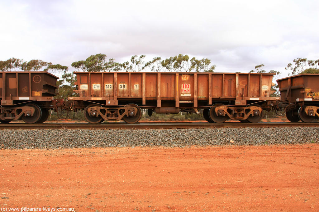 100822 5954
WO type iron ore waggon WO 31235 is one of a batch of sixty two built by Goninan WA between April and August 2000 with serial number 950086-005 and fleet number 127 for Koolyanobbing iron ore operations, and is a Goninan built replacement WO type waggon that replaces the original WAGR built WO type waggon with the newer style WOD type and has square features opposed to the curved ones as on the original WO class, Binduli Triangle 22nd August 2010.
Keywords: WO-type;WO31235;Goninan-WA;950086-005;