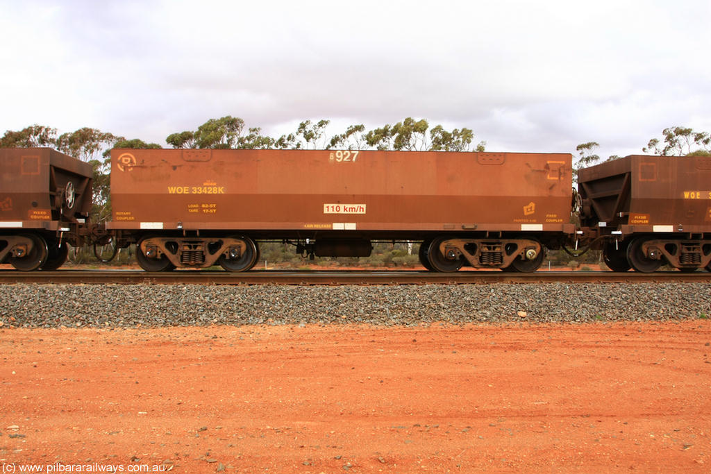 100822 5959
WOE type iron ore waggon WOE 33428 is one of a batch of one hundred and forty one built by United Group Rail WA between November 2005 and April 2006 with serial number 950142-133 and fleet number 8927 for Koolyanobbing iron ore operations, Binduli Triangle 22nd August 2010.
Keywords: WOE-type;WOE33428;United-Group-Rail-WA;950142-133;