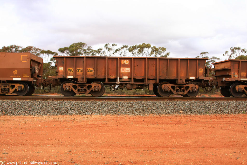 100822 5968
WO type iron ore waggon WO 31255 is one of a batch of eighty six built by WAGR Midland Workshops between 1967 and March 1968 with fleet number 143 for Koolyanobbing iron ore operations, with a 75 ton and 1018 ft³ capacity, Binduli Triangle 22nd August 2010. This unit was converted to WOC for coal in 1986 till 1996 when it was re-classed back to WO.
Keywords: WO-type;WO31255;WAGR-Midland-WS;