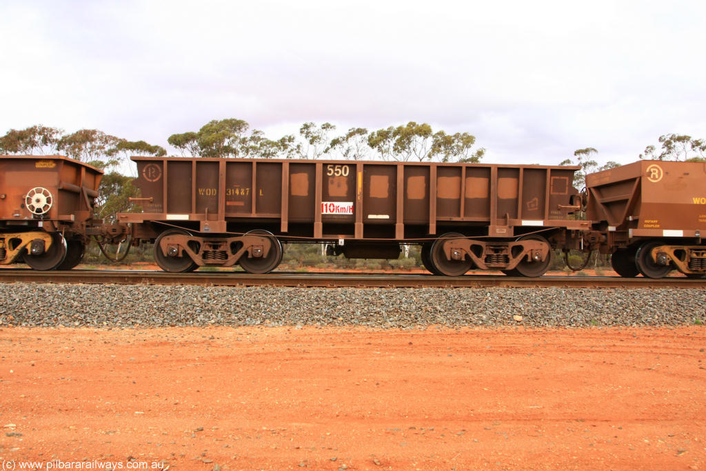 100822 5970
WOD type iron ore waggon WOD 31487 is one of a batch of sixty two built by Goninan WA between April and August 2000 with serial number 950086-059 and fleet number 550 for Koolyanobbing iron ore operations with a 75 ton capacity for Portman Mining to cart their Koolyanobbing iron ore to Esperance, now with PORTMAN painted out, Binduli Triangle 22nd August 2010.
Keywords: WOD-type;WOD31487;Goninan-WA;950086-059;