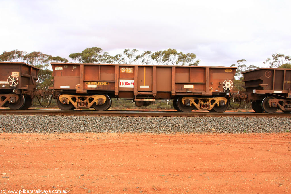 100822 5971
WOB type iron ore waggon WOB 31390 is one of a batch of twenty five built by Comeng WA between 1974 and 1975 and converted from Mt Newman high sided waggons by WAGR Midland Workshops with a capacity of 67 tons with fleet number 315 for Koolyanobbing iron ore operations and is one of the 15 converted to WSM type ballast hoppers by re-fitting the removed top section of the body and fitting bottom discharge doors. Converted back to WOB in 1997. Binduli Triangle, 22nd August 2010.
Keywords: WOB-type;WOB31390;Comeng-WA;WSM-type;Mt-Newman-Mining;