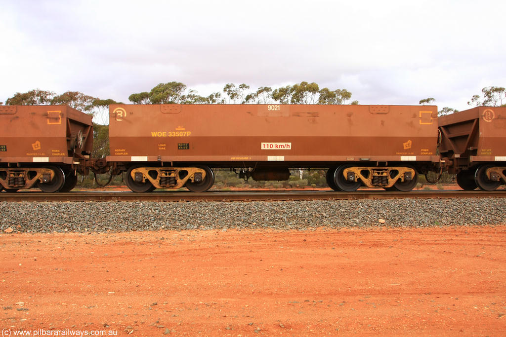 100822 5990
WOE type iron ore waggon WOE 33507 is one of a batch of one hundred and twenty eight built by United Group Rail WA between August 2008 and March 2009 with serial number 950211-047 and fleet number 9021 for Koolyanobbing iron ore operations, Binduli Triangle 22nd August 2010.
Keywords: WOE-type;WOE33507;United-Group-Rail-WA;950211-047;