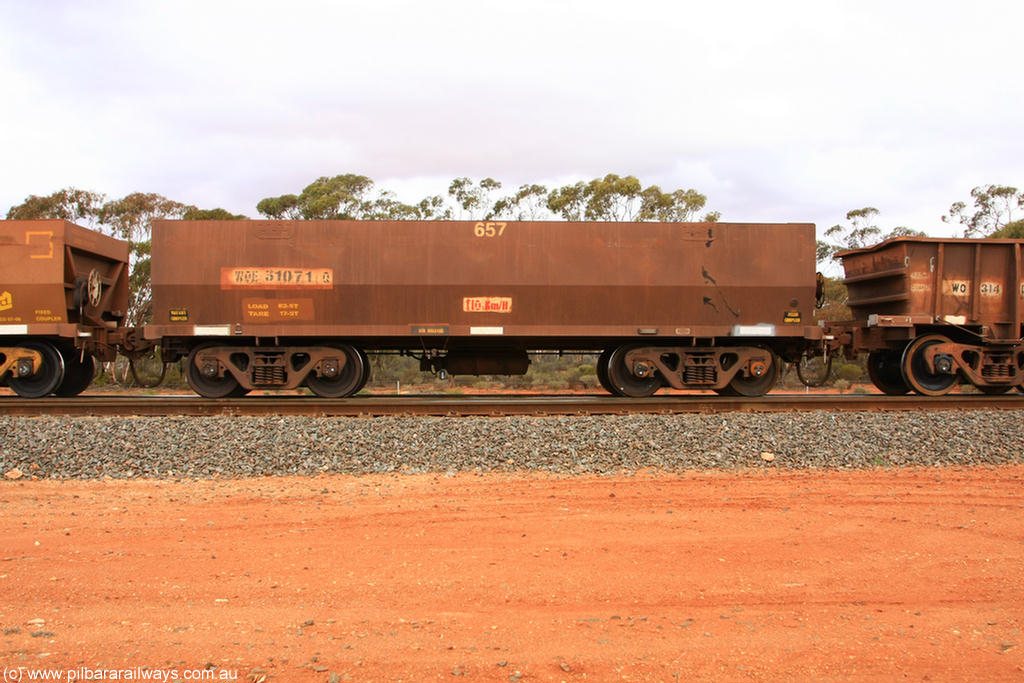 100822 5997
WOE type iron ore waggon WOE 31071 is one of a batch of one hundred and thirty built by Goninan WA between March and August 2001 with serial number 950092-061 and fleet number 657 for Koolyanobbing iron ore operations, Binduli Triangle 22nd August 2010.
Keywords: WOE-type;WOE31071;Goninan-WA;950092-061;