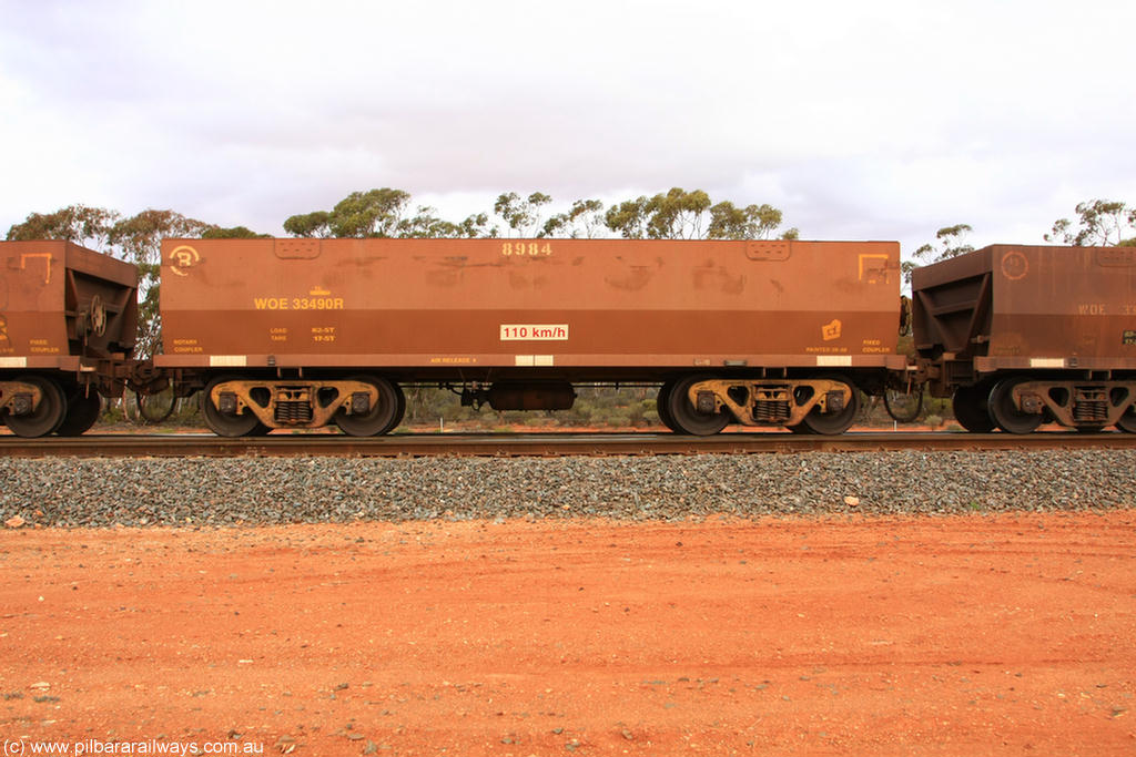 100822 6002
WOE type iron ore waggon WOE 33490 is one of a batch of one hundred and twenty eight built by United Group Rail WA between August 2008 and March 2009 with serial number 950211-030 and fleet number 8984 for Koolyanobbing iron ore operations, Binduli Triangle 22nd August 2010.
Keywords: WOE-type;WOE33490;United-Group-Rail-WA;950211-030;