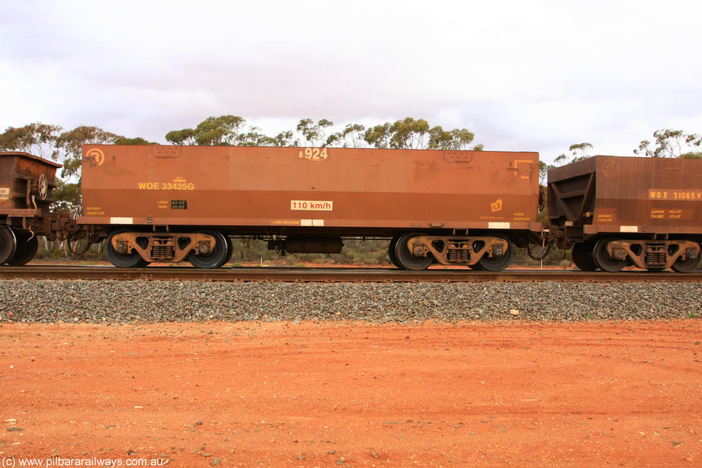 100822 6015
WOE type iron ore waggon WOE 33425 is one of a batch of one hundred and forty one built by United Group Rail WA between November 2005 and April 2006 with serial number 950142-130 and fleet number 8924 for Koolyanobbing iron ore operations, Binduli Triangle 22nd August 2010.
Keywords: WOE-type;WOE33425;United-Group-Rail-WA;950142-130;