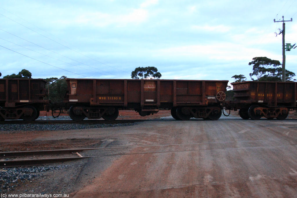 100822 6260
WOB type iron ore waggon WOB 31393 is one of a batch of twenty five built by Comeng WA between 1974 and 1975 and converted from Mt Newman high sided waggons by WAGR Midland Workshops with a capacity of 67 tons with fleet number 318 for Koolyanobbing iron ore operations. This waggon was also converted to a WSM type ballast hopper by re-fitting the cut down top section and having bottom discharge doors fitted, converted back to WOB in 1998, on empty train 1416 at Hampton, 22nd August 2010.
Keywords: WOB-type;WOB31393;Comeng-WA;WSM-type;Mt-Newman-Mining;