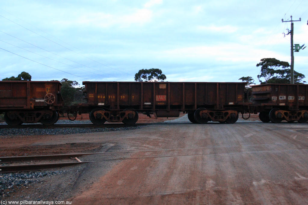 100822 6261
WOA type iron ore waggon WOA 31339 is one of a batch of thirty nine built by WAGR Midland Workshops between 1970 and 1971 with fleet number 217 for Koolyanobbing iron ore operations, with a 75 ton and 1018 ft³ capacity, on empty train 1416 at Hampton, 22nd August 2010.
Keywords: WOA-type;WOA31339;WAGR-Midland-WS;