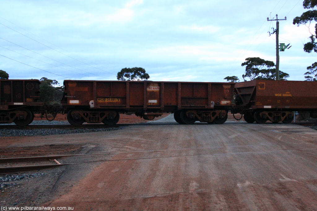 100822 6277
WOB type iron ore waggon WOB 31391 is one of a batch of twenty five built by Comeng WA between 1974 and 1975 and converted from Mt Newman high sided waggons by WAGR Midland Workshops with a capacity of 67 tons with fleet number 316 for Koolyanobbing iron ore operations. This waggon was also converted to a WSM type ballast hopper by re-fitting the cut down top section and having bottom discharge doors fitted, converted back to WOB in 1998, on empty train 1416 at Hampton, 22nd August 2010.
Keywords: WOB-type;WOB31391;Comeng-WA;WSM-type;Mt-Newman-Mining;