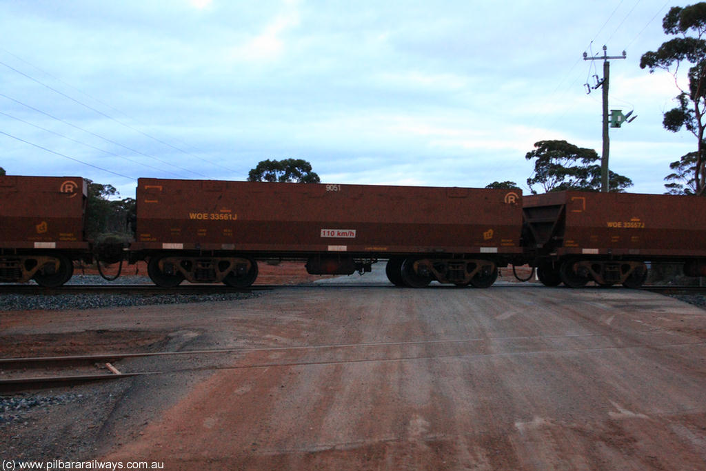100822 6300
WOE type iron ore waggon WOE 33561 is one of a batch of one hundred and twenty eight built by United Group Rail WA between August 2008 and March 2009 with serial number 950211-101 and fleet number 9051 for Koolyanobbing iron ore operations, on empty train 1416 at Hampton, 22nd August 2010.
Keywords: WOE-type;WOE33561;United-Group-Rail-WA;950211-101;