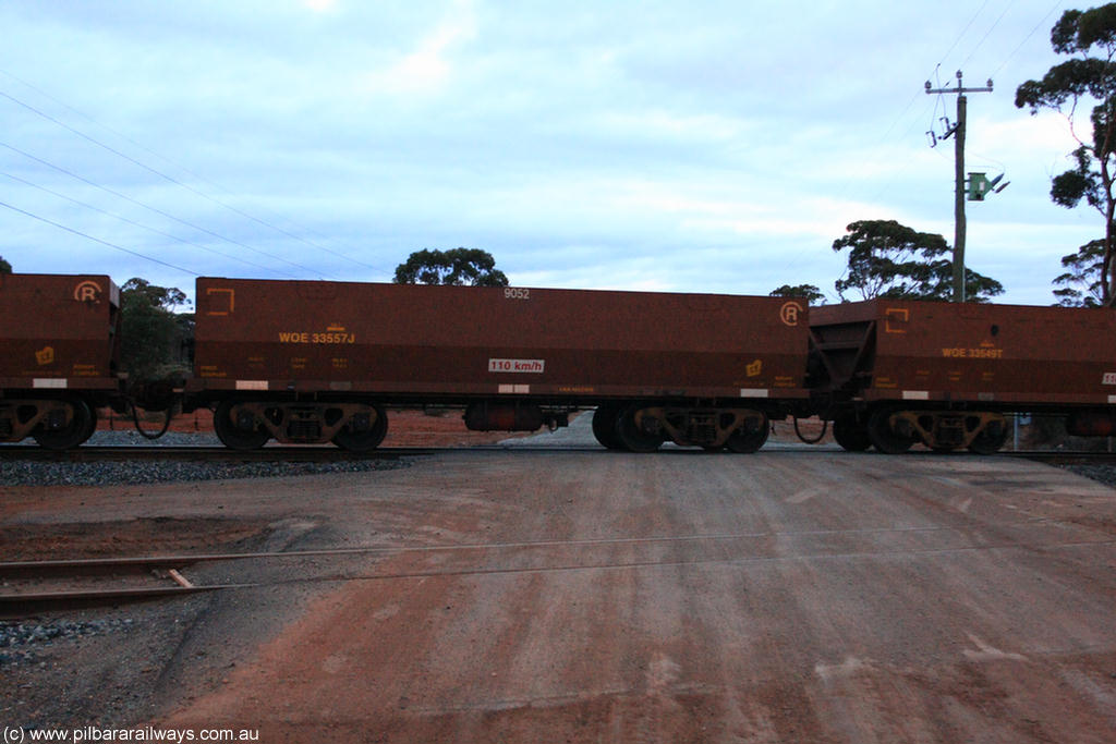 100822 6301
WOE type iron ore waggon WOE 33557 is one of a batch of one hundred and twenty eight built by United Group Rail WA between August 2008 and March 2009 with serial number 950211-097 and fleet number 9052 for Koolyanobbing iron ore operations, on empty train 1416 at Hampton, 22nd August 2010.
Keywords: WOE-type;WOE33557;United-Group-Rail-WA;950211-097;