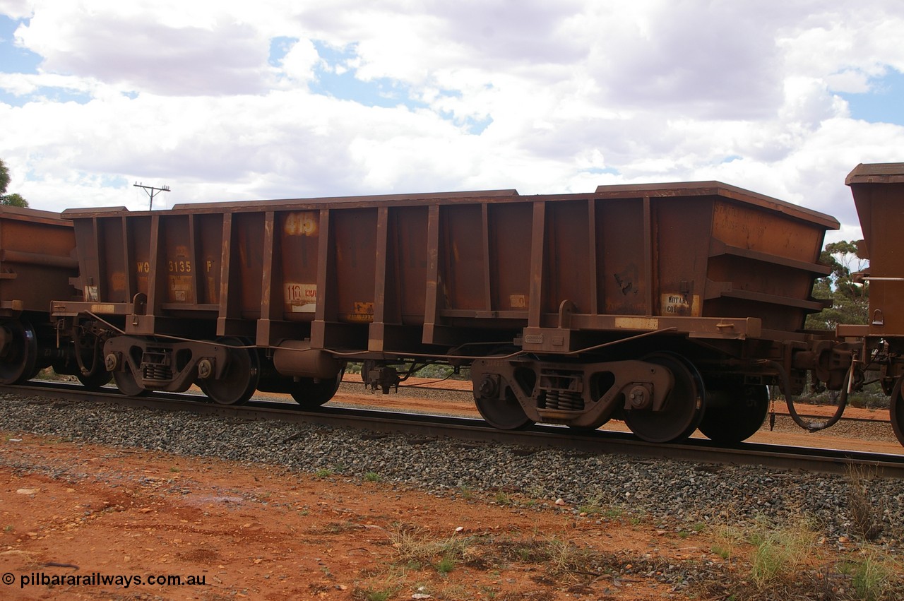 PD 12413
Binduli, WOC type iron ore waggon WOC 31355 is one of a batch of thirty built by Goninan WA between October 1997 to January 1998 with fleet number 415 for Koolyanobbing iron ore operations with a 75 ton capacity, note the added angled lip to the top of the body. 17th Feb 2013.
Keywords: Peter-D-Image;WOC-type;WOC31355;Goninan-WA;