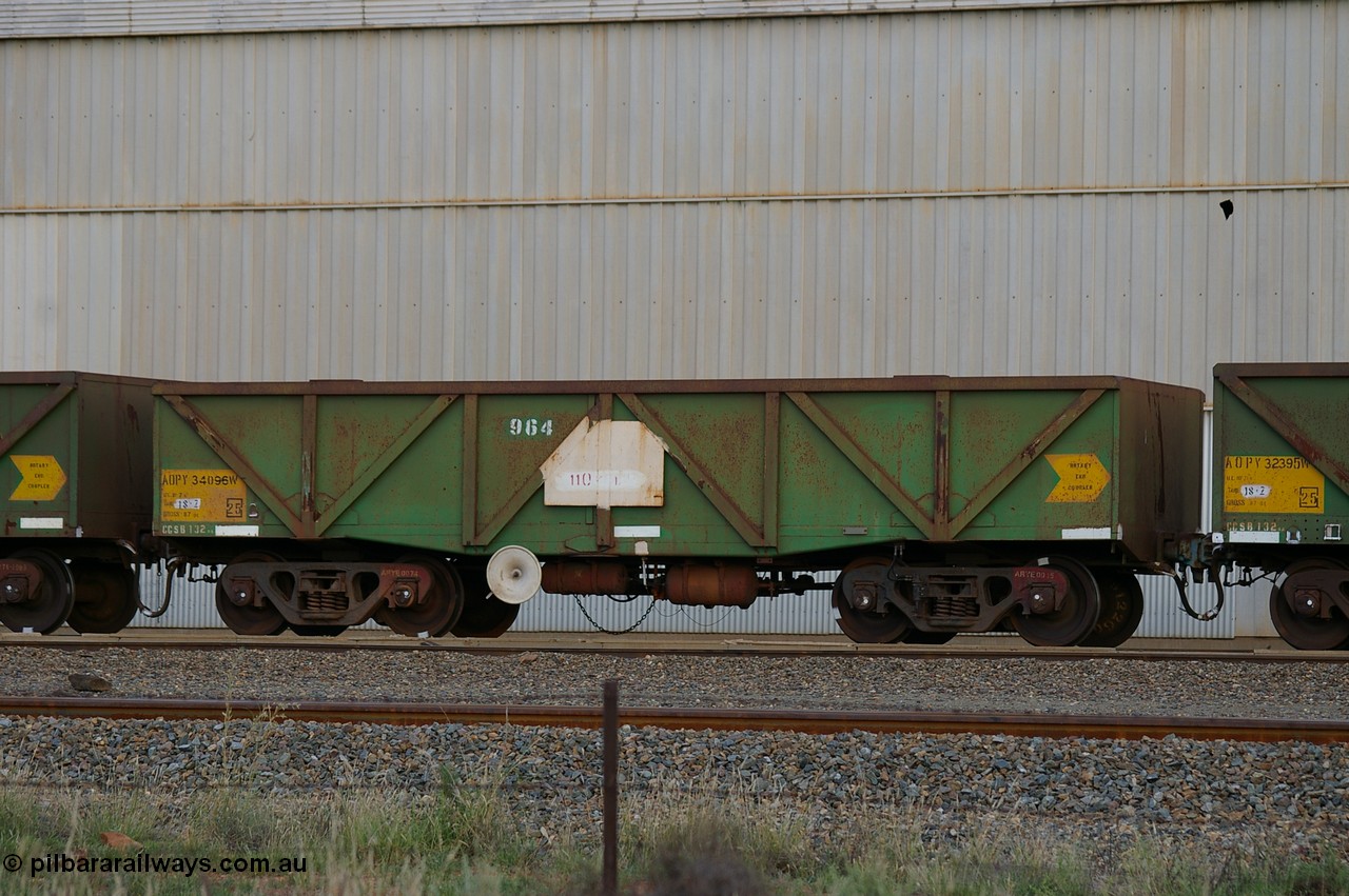 PD 12847
West Kalgoorlie, AOPY 34096 with fleet number 964 and of the drop floor type with disc type handbrake wheel, one of seventy ex ANR coal waggons rebuilt from AOKF type by Bluebird Engineering SA in service with ARG on Koolyanobbing iron ore trains. They used to be three metres longer and originally built by Metropolitan Cammell Britain as GB type in 1952-55, seen here in a rake with sister waggons.
Keywords: Peter-D-Image;AOPY-type;AOPY34096;Bluebird-Engineering-SA;Metropolitan-Cammell-Britain;GB-type;